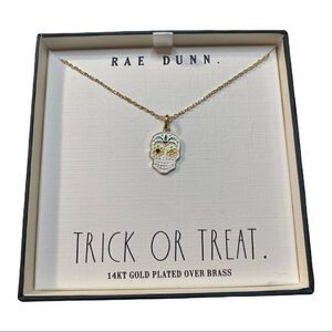 Rae Dunn Sugar Skull Necklace on delicate gold toned chain.
